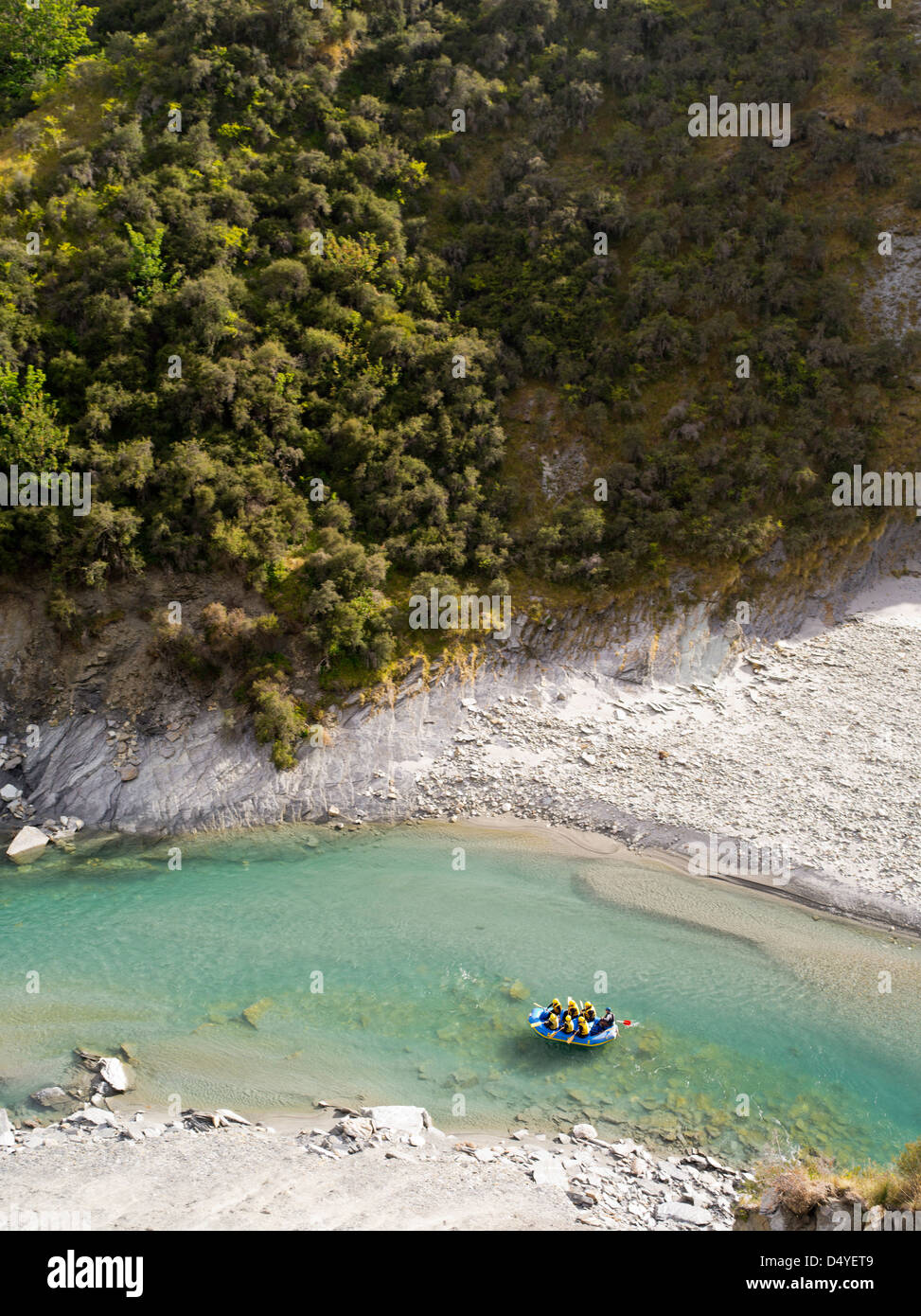 A group of people rafts down the Shotover River in Skipper's Canyon, near Queenstown, Otago, New Zealand. Stock Photo