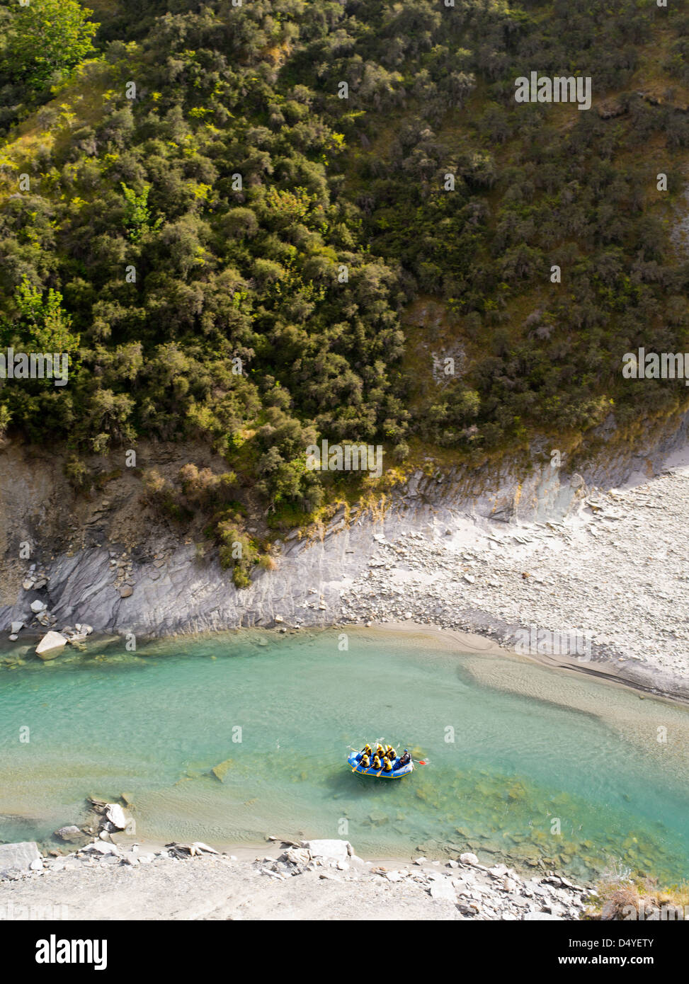 A group of people rafts down the Shotover River in Skipper's Canyon, near Queenstown, Otago, New Zealand. Stock Photo