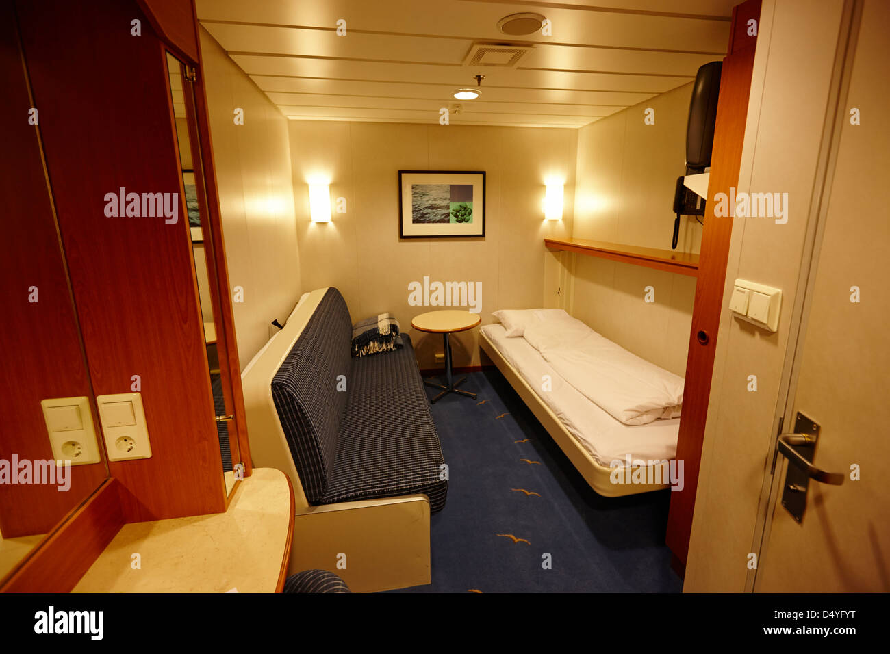 small inside deck passenger cabin on hurtigruten passenger ship Tromso troms Norway europe Stock Photo
