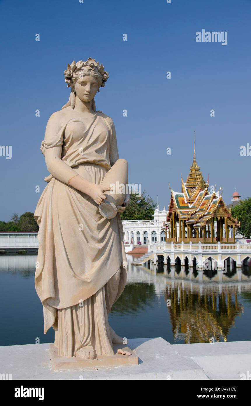 Thailand, Bangkok. Ayuthaya Province. Bang Pa-in Palace. Roman statues in front of Aisawan Dhipaya Asana Pavilion. Stock Photo