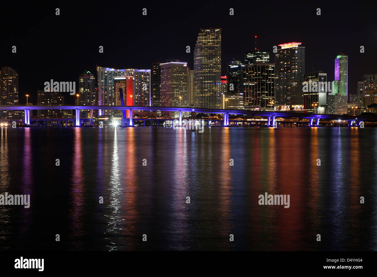 Miami City Downtown Macarthur causeway Night Shot after Sunset Bridge Highway Skyline Lights Ocean Gulf Florida Stock Photo
