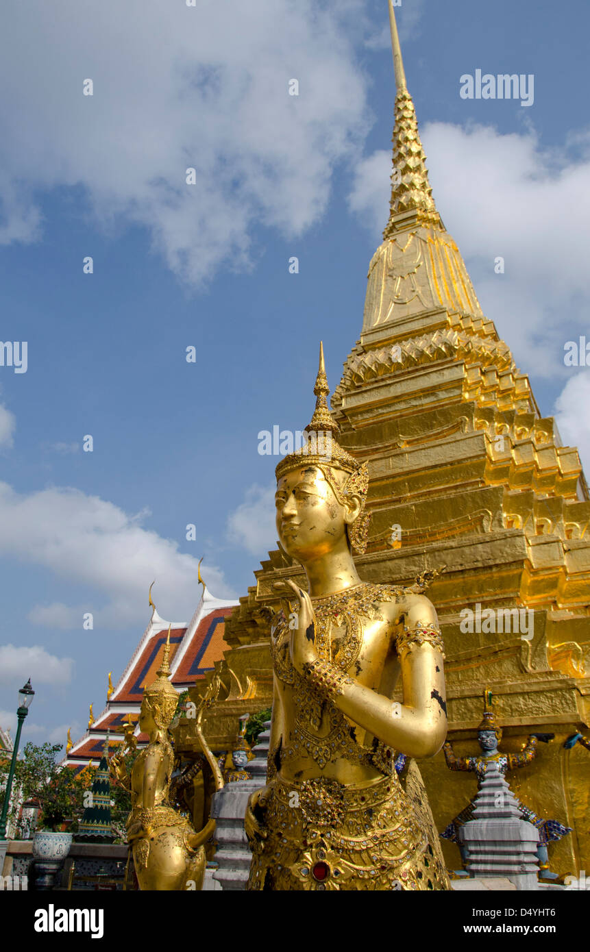 Thailand, Bangkok. The Grand Palace. The Upper Terrace monuments. Golden statue of the mythological Kinnari (for females). Stock Photo