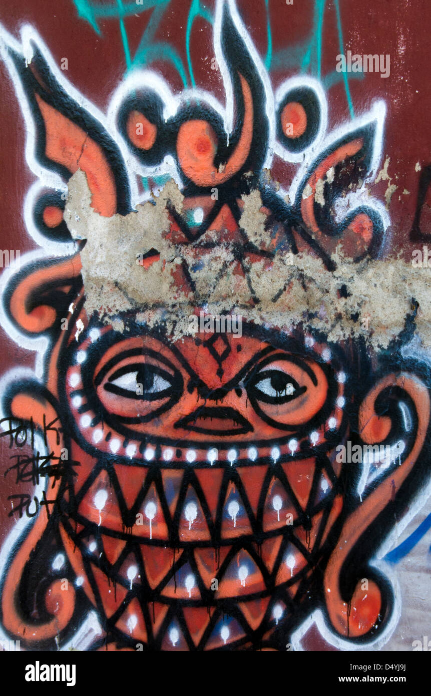 Monster graffiti on plaster wall in Oaxaca, Mexico, attributed to Begor, aka 'Onion.' Stock Photo