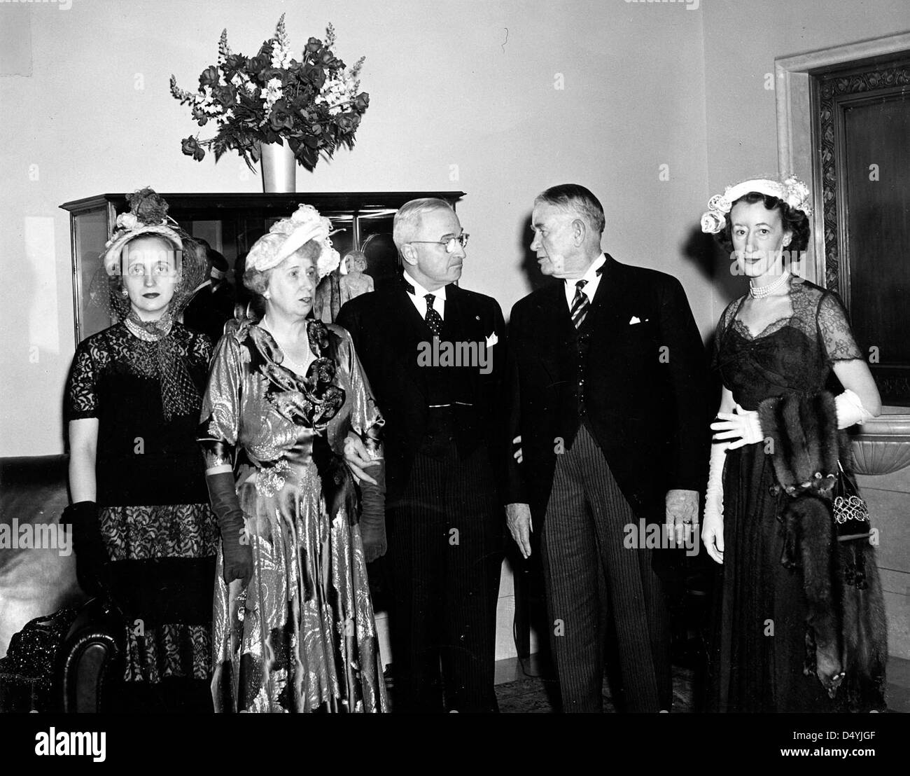 Photograph of the Trumans and Barkleys at an Inaugural Reception, 01/20/1949 Stock Photo