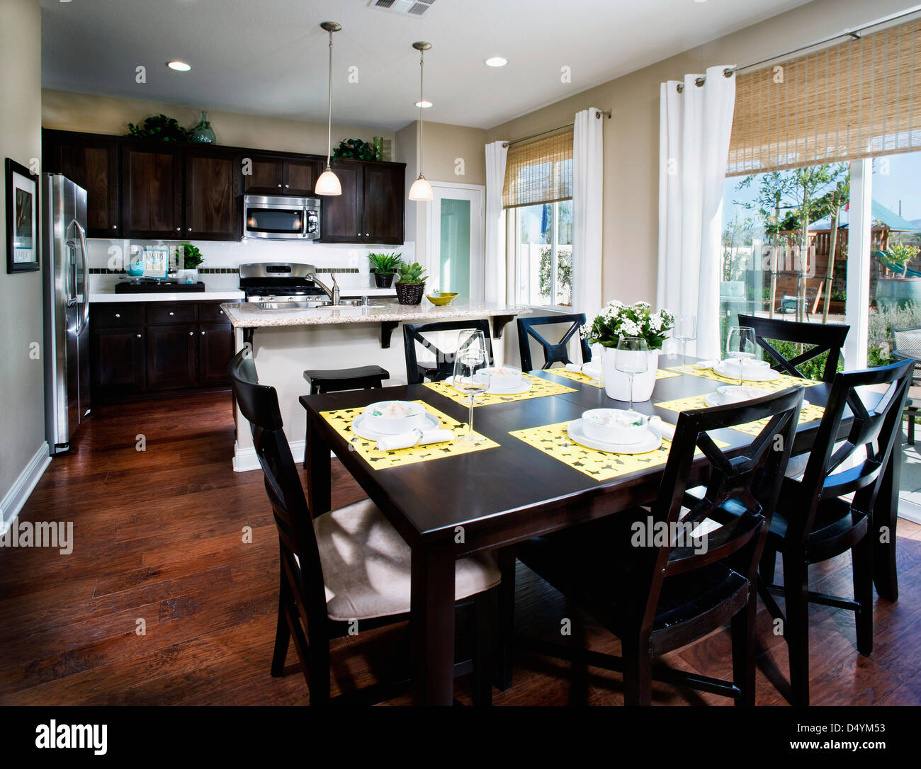 Dining area and kitchen in contemporary home, Palmdale, California, USA Stock Photo