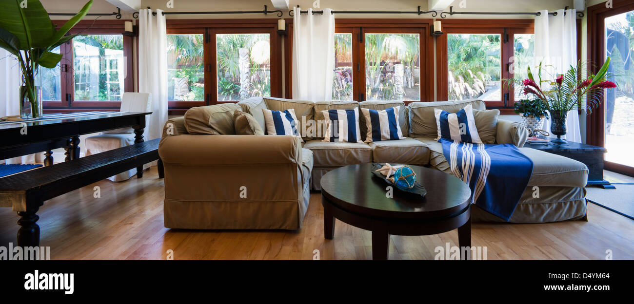 Sectional sofa with throw pillows in living room, Encinitas, California, USA Stock Photo