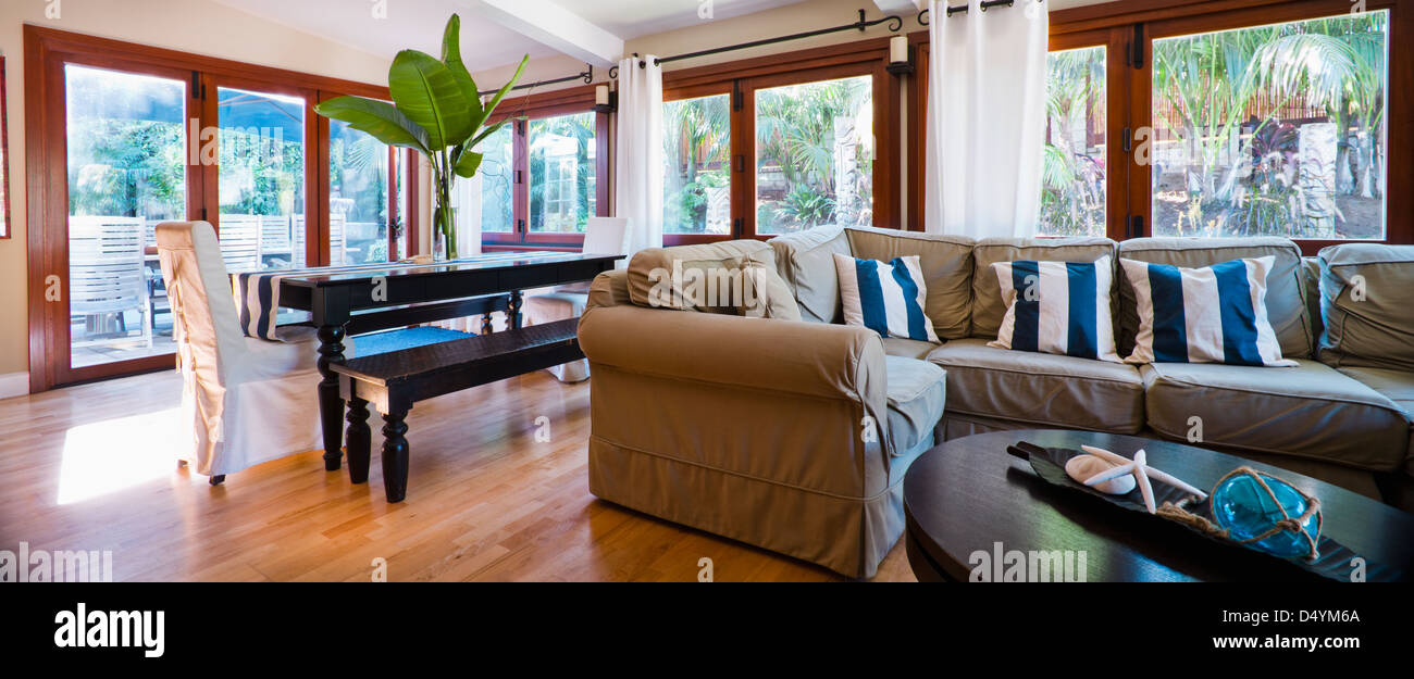 Sectional sofa with throw pillows in living room, Encinitas, California, USA Stock Photo