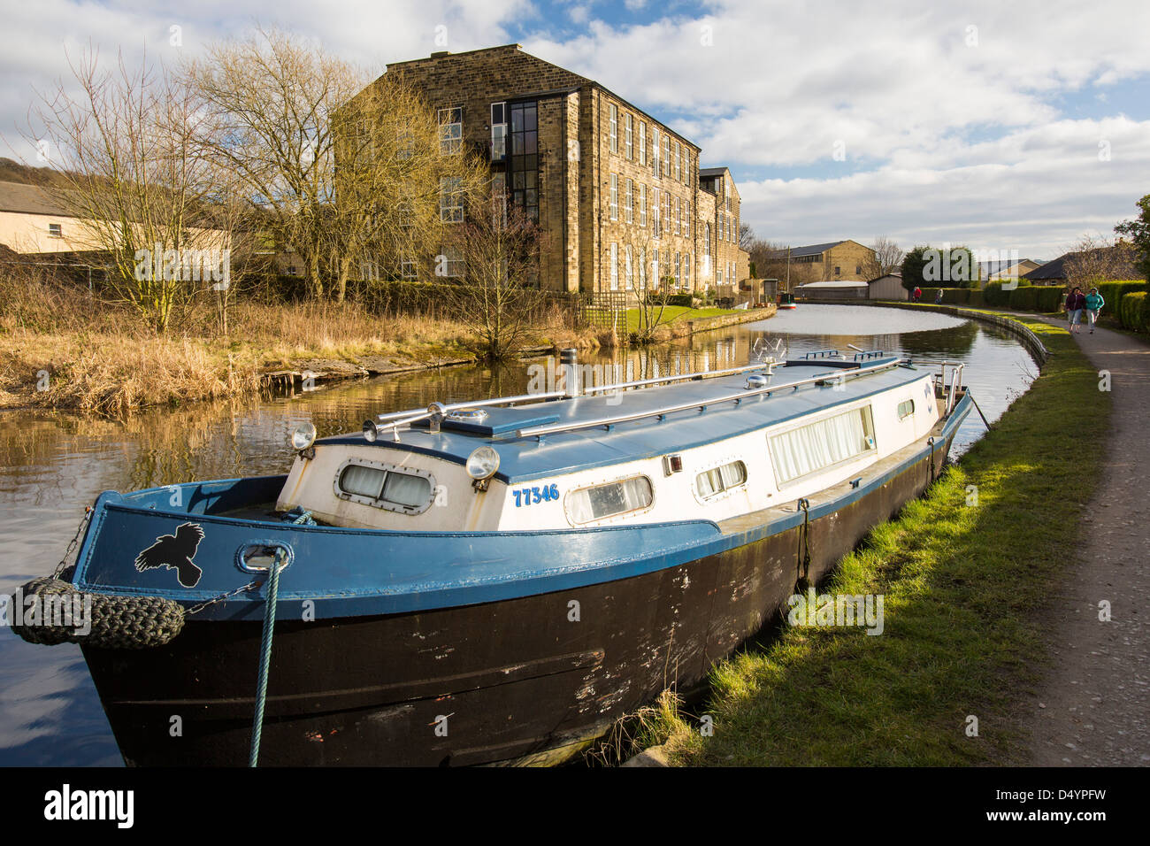 An old mill converted into apartments on the Leeds Liverpool canal at