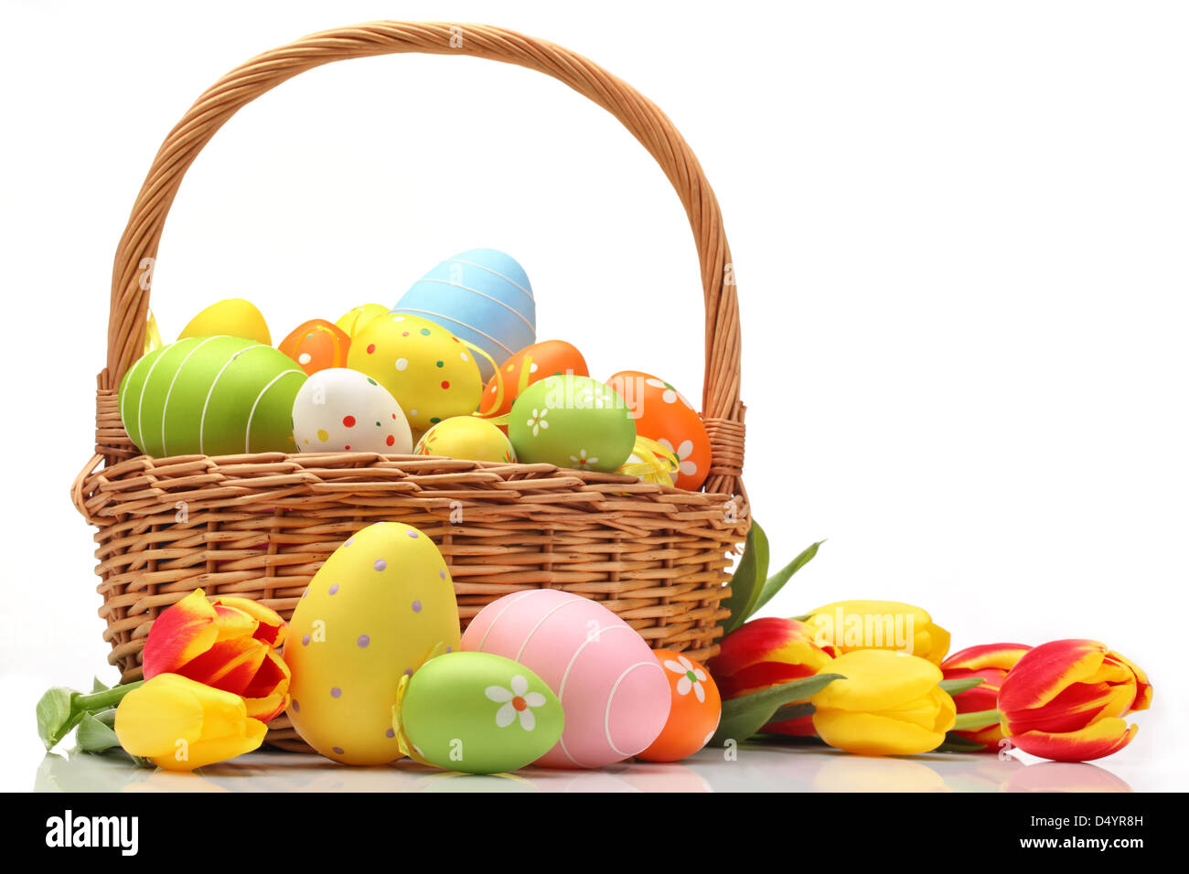 Easter eggs in a wicker basket Stock Photo