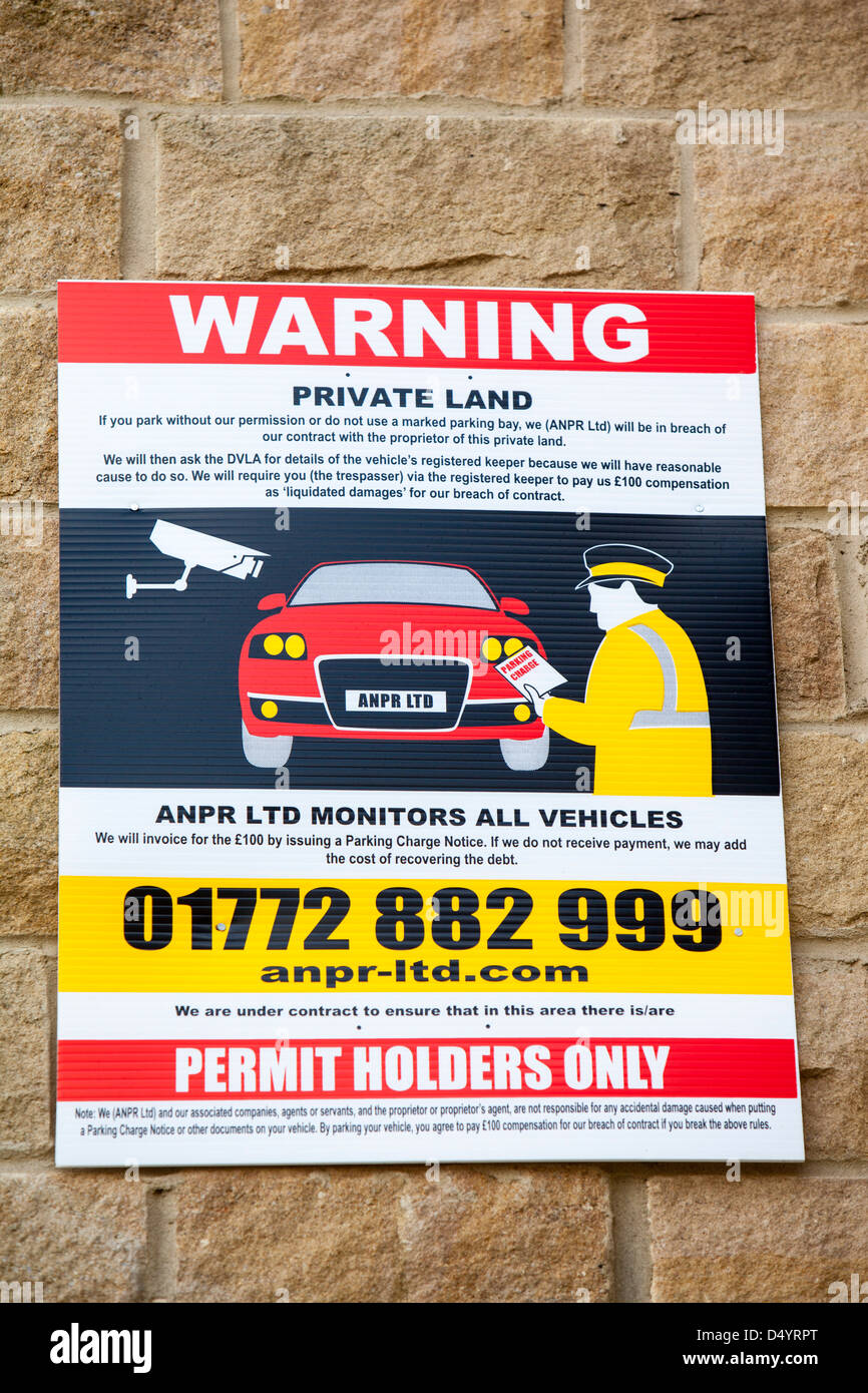 A wheel clamping warning sign on private land in Bingley, Yorkshire, UK