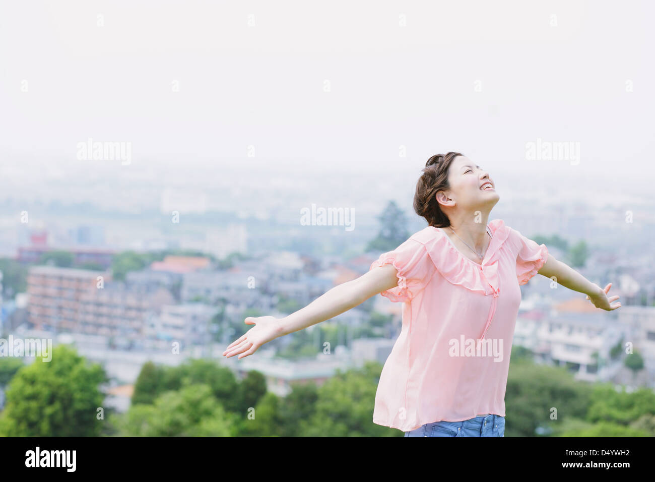 Japanese woman smiling with closed eyes Stock Photo - Alamy