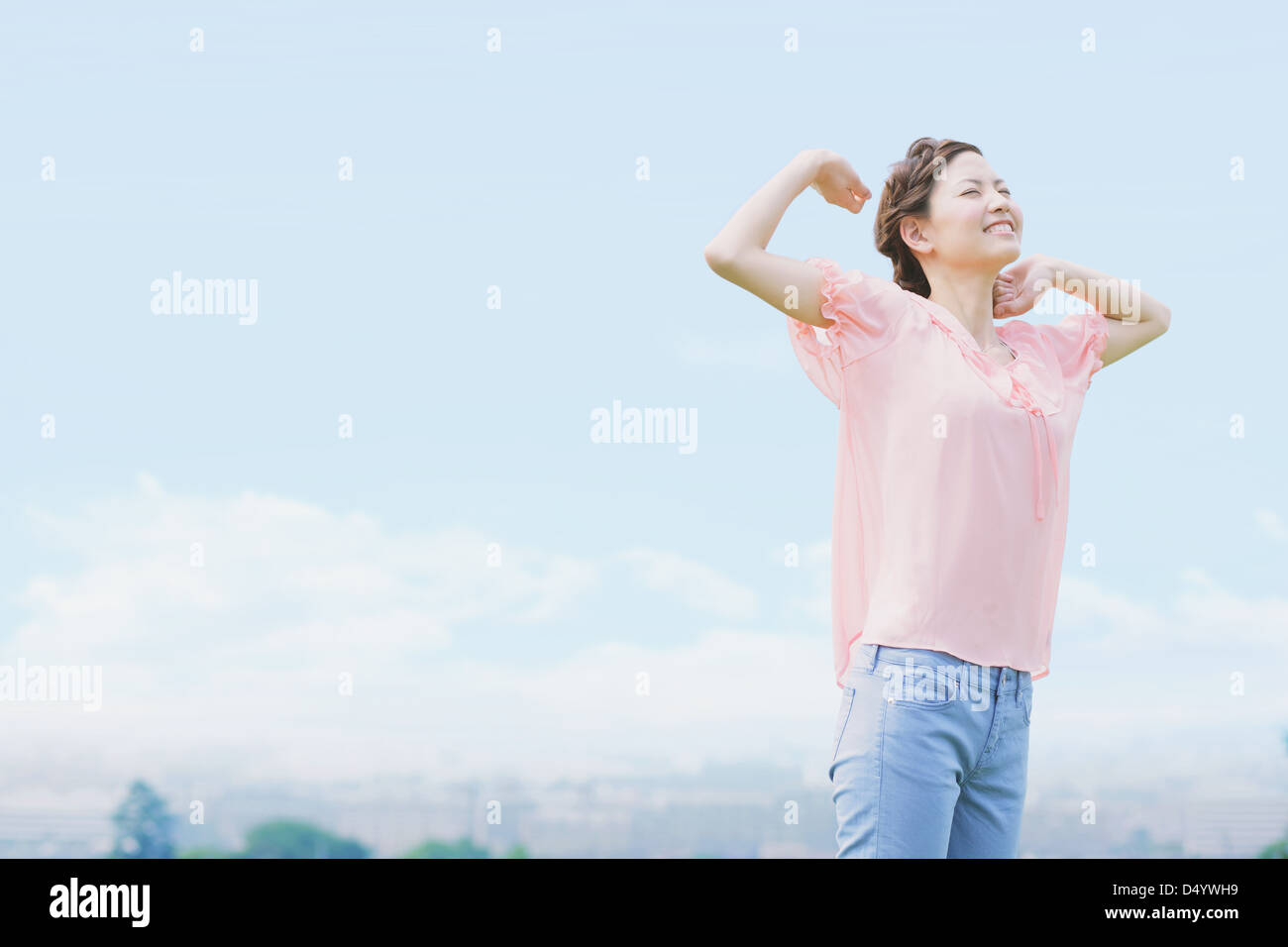 Japanese woman smiling with closed eyes Stock Photo - Alamy