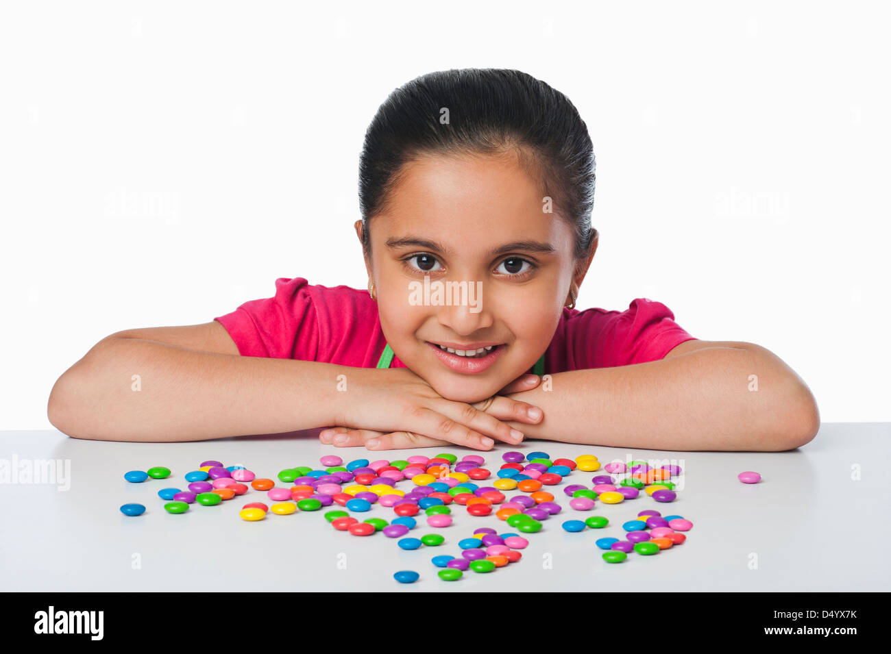 Indian girl smiling at camera Cut Out Stock Images & Pictures - Alamy