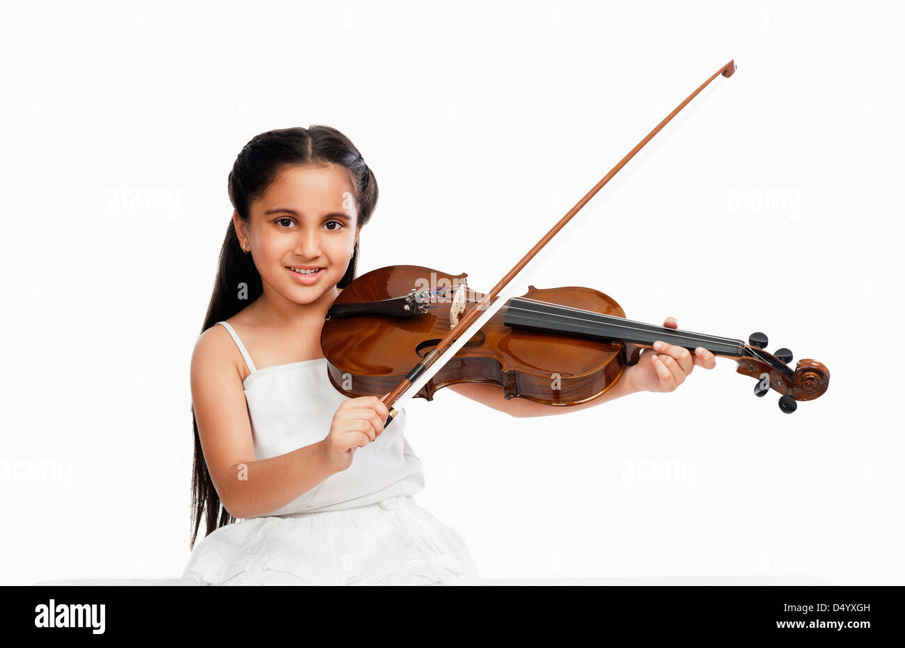 Girl playing a violin Stock Photo
