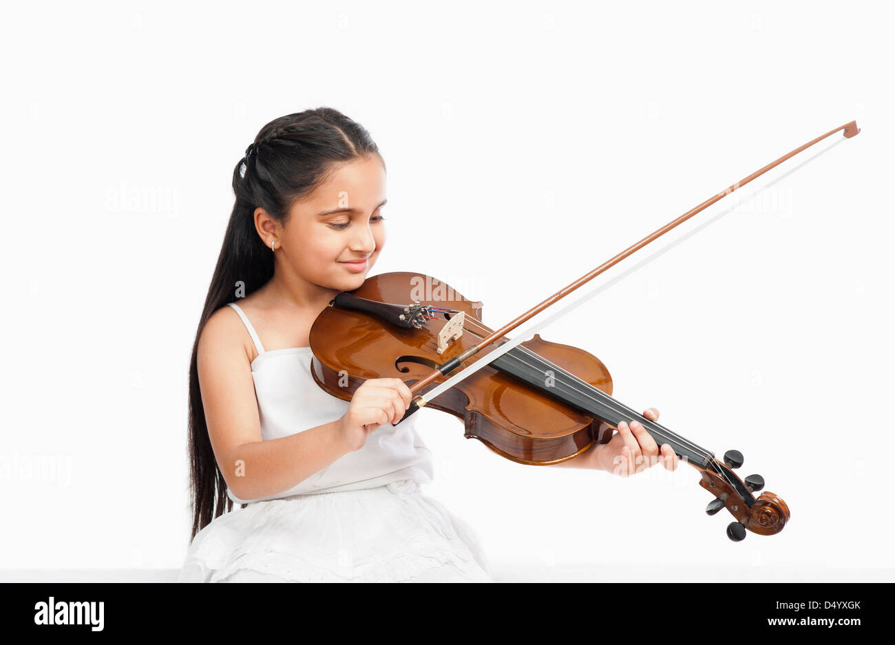Girl playing a violin Stock Photo