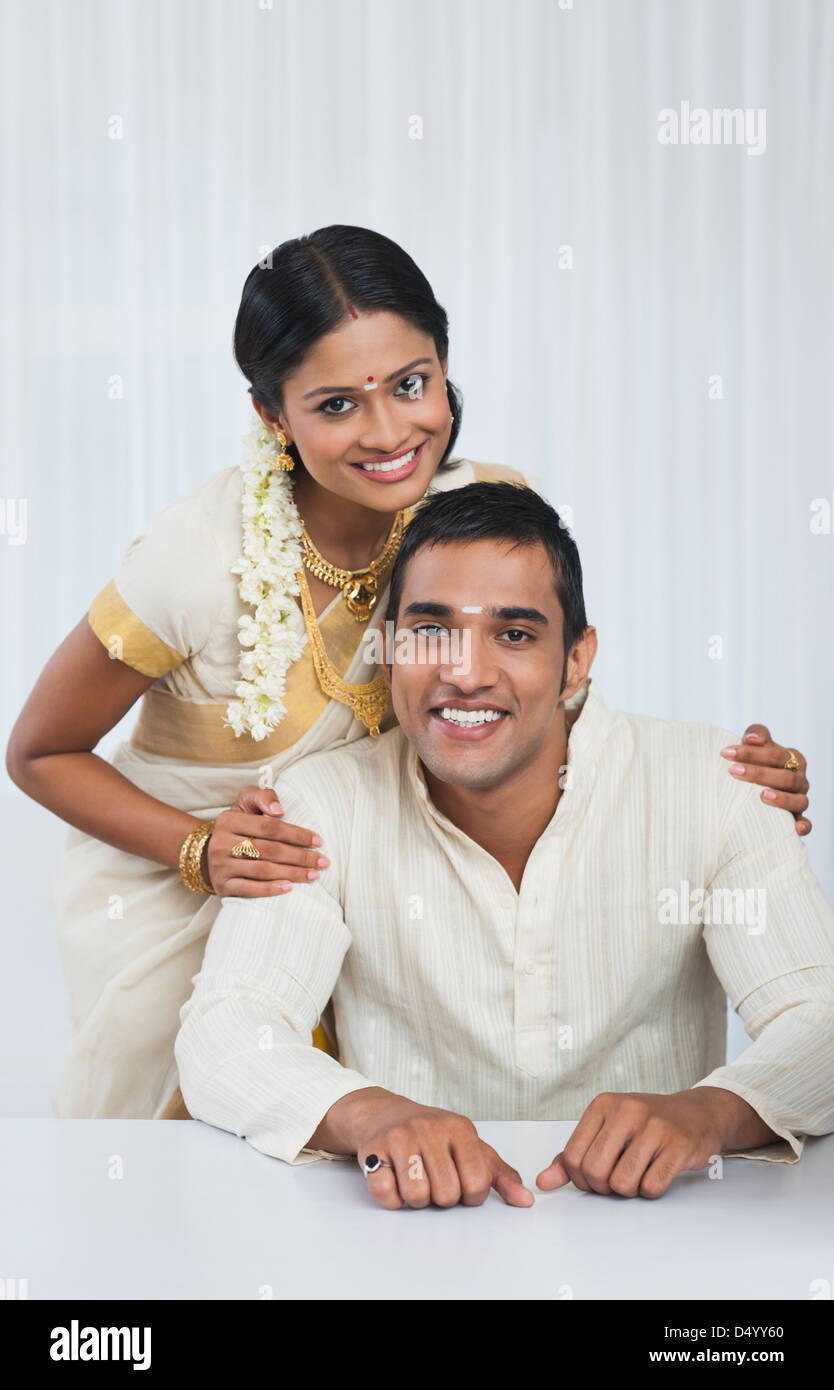 Portrait of a South Indian couple smiling Stock Photo - Alamy