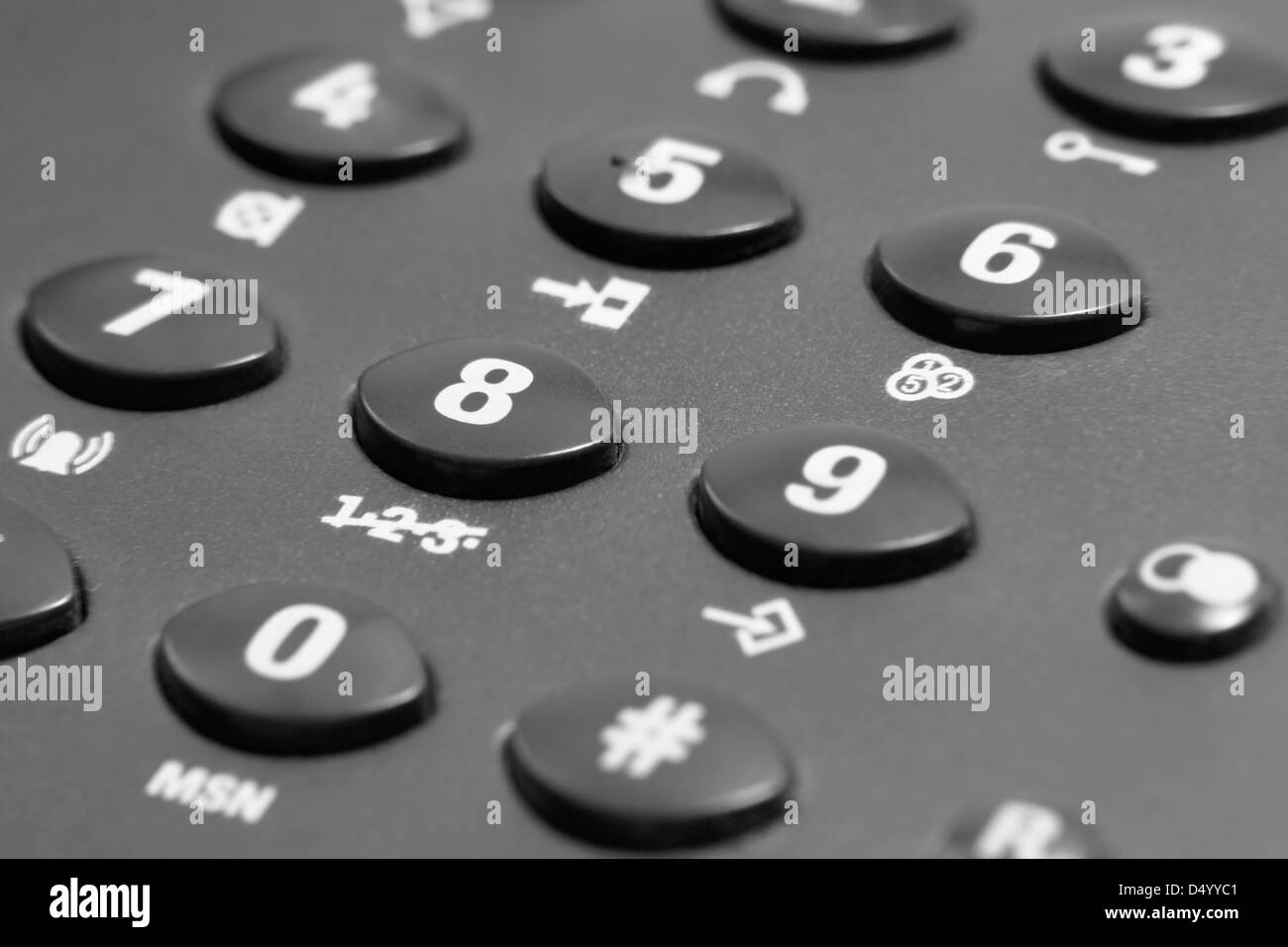 full frame closeup of a dark grey phone keypad Stock Photo