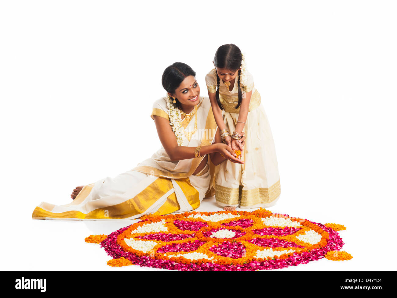 Mother daughter making rangoli hi-res stock photography and images - Alamy
