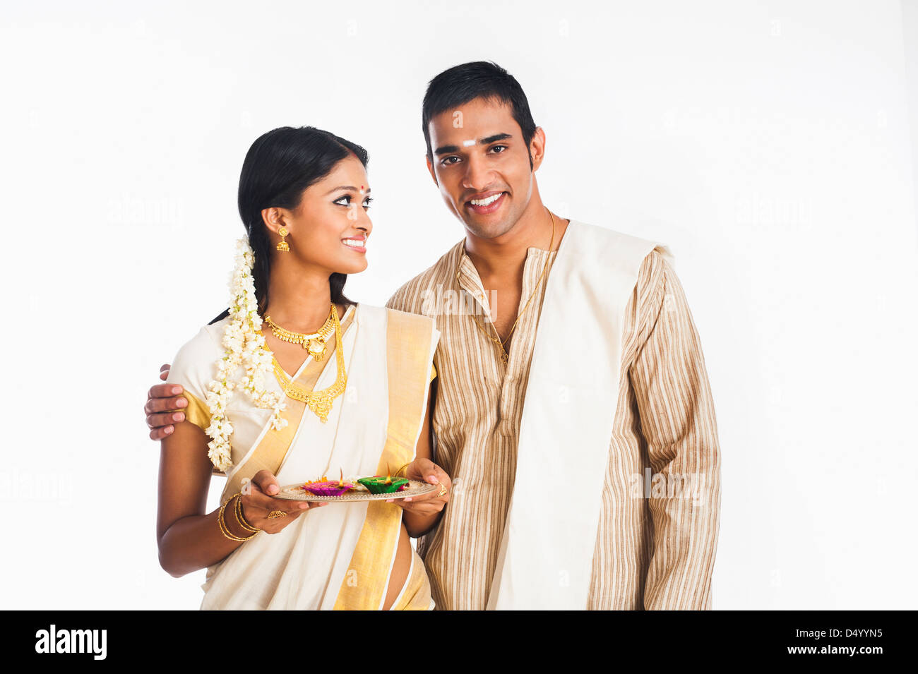 South Indian couple smiling at Onam Stock Photo - Alamy