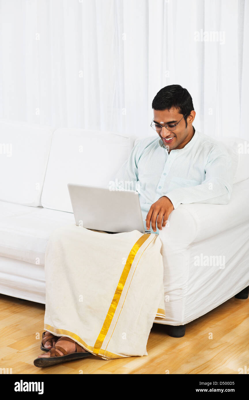 Indian man with laptop hi-res stock photography and images - Alamy