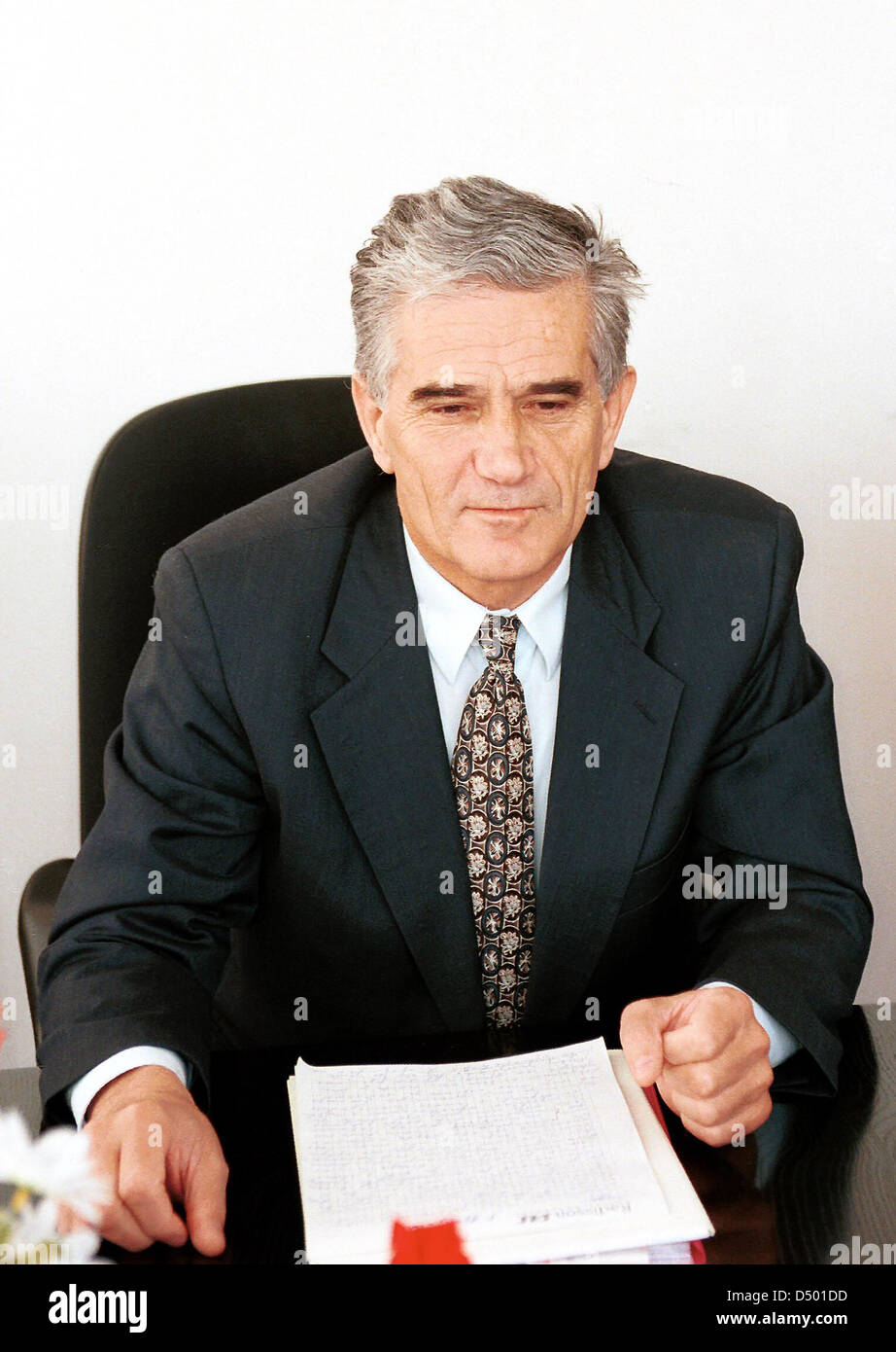 PALE, BOSNIA, 12 JUNE 1996 ------- Bosnian Serb foreign minister Alexi Buha, seen here in his office in the Bosnian town of Pale. Buha was a close ally to Bosnian Serb war criminal Radovan Karadzic, and is suspected of having been one of the chief ideologues behind the Serb ethnic cleansing campaign in Bosnia. It is thought that Buha is under secret indictment by the War Crimes Tribunal in the Hugue. Stock Photo