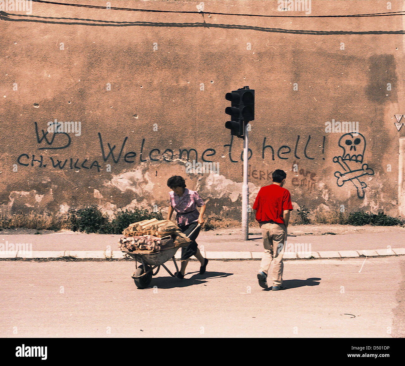 SARAJEVO, BOSNIA, 03 JULY 1993 ---- The famous 'welcome to hell' graffiti on a wall in Sarajevo. Stock Photo