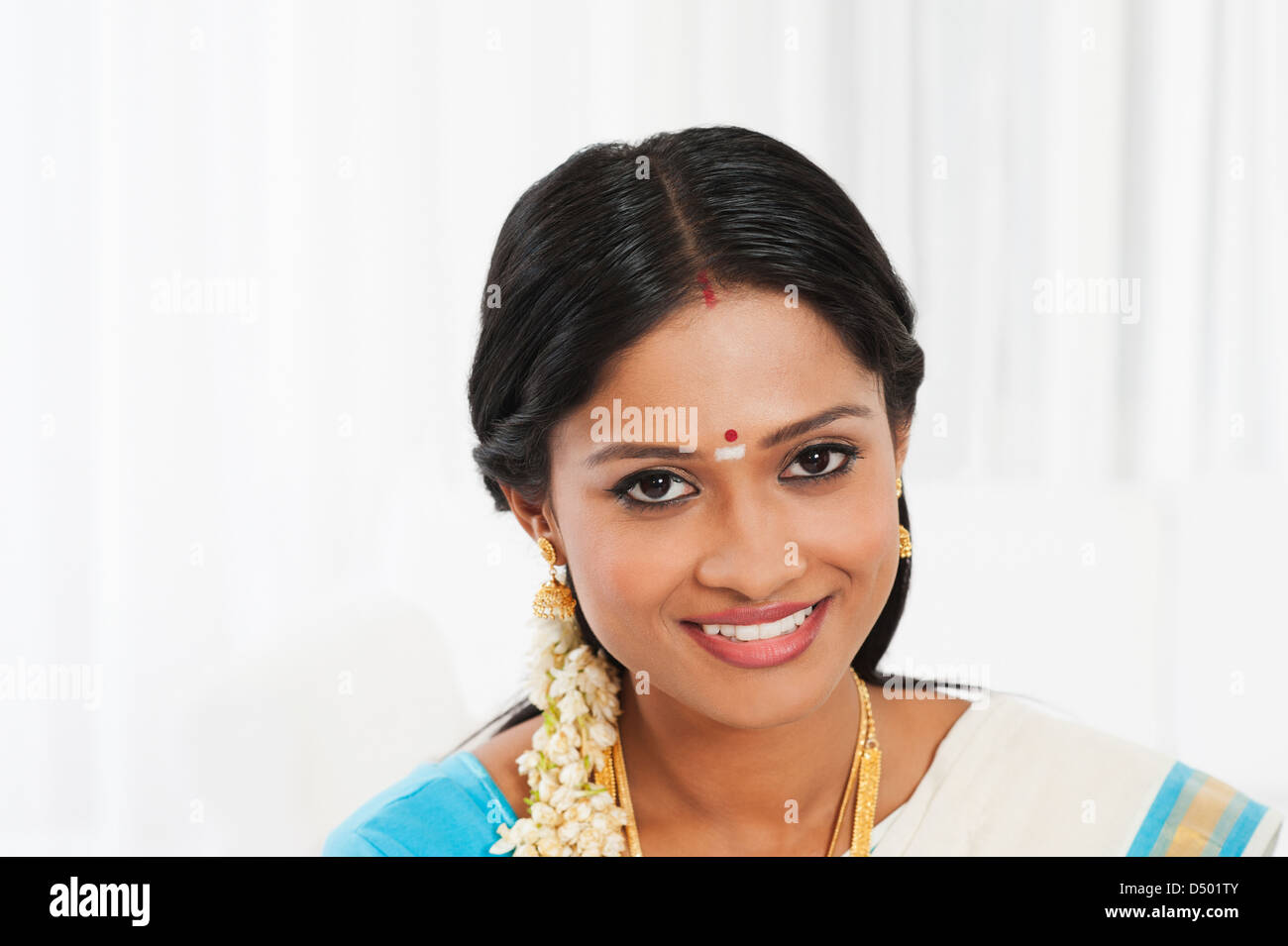 South Indian woman smiling Stock Photo - Alamy