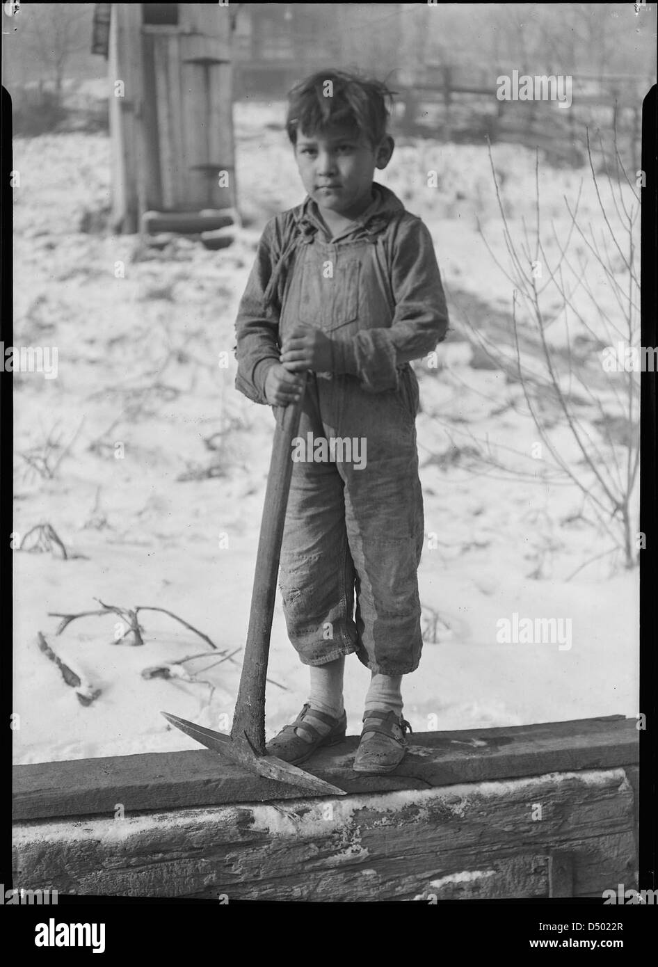 Scotts' Run, West Virginia. Miner's child digging coal from mine refuse (Mexican). Bertha Hollow ...