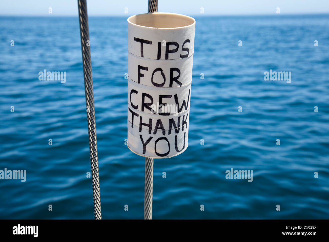 Tips for Crew Holder on Cruise Boat on Table Bay - Western Cape - South Africa Stock Photo