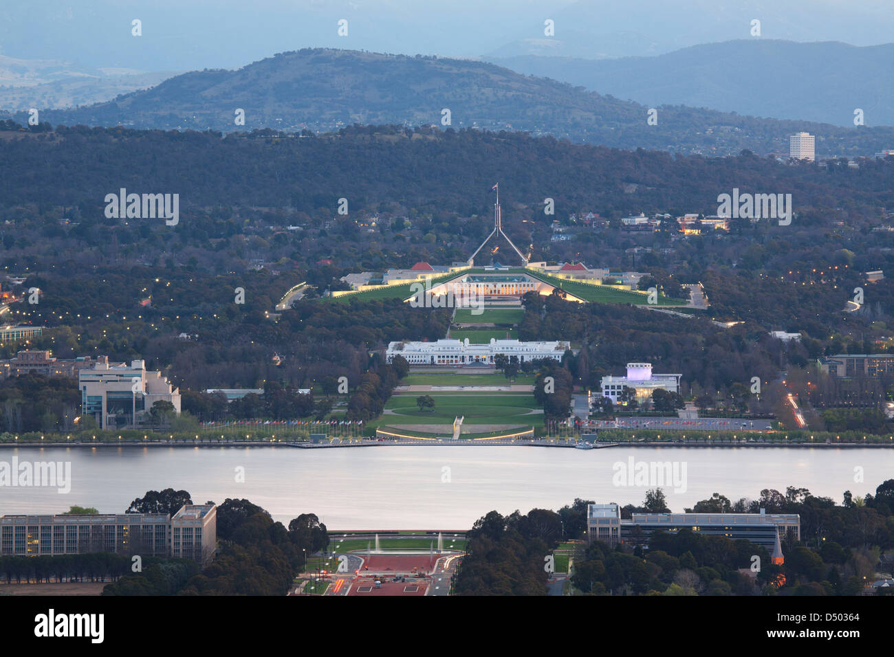 Elevated aerial view at sunset over Lake Burley Griffin to Parliament House on Capital Hill Canberra Australia Stock Photo