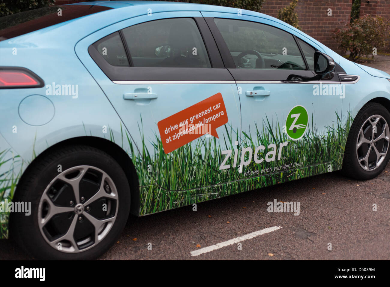 An Opel Ampera electric car participates in 'zipcar's car sharing network- Stock Photo