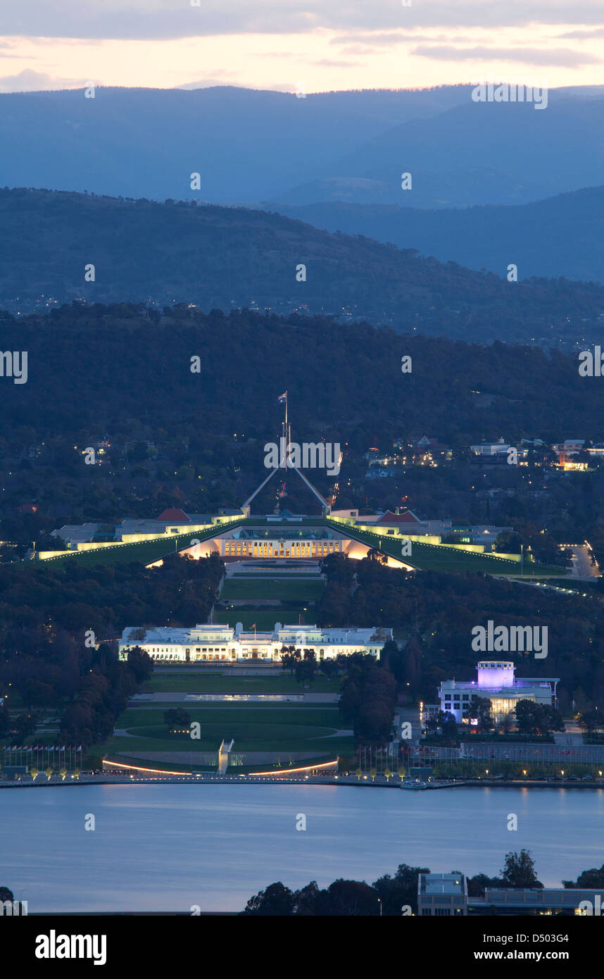 Elevated aerial view at sunset over Lake Burley Griffin to Parliament House on Capital Hill Canberra Australia Stock Photo