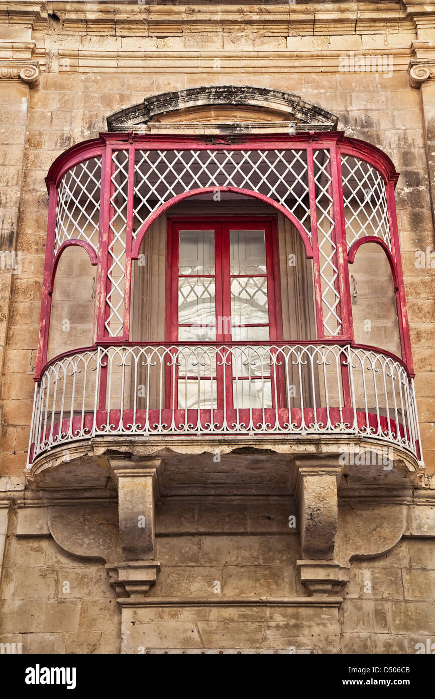 Typical Maltese balcony in an apartment in an ancient building. Stock Photo
