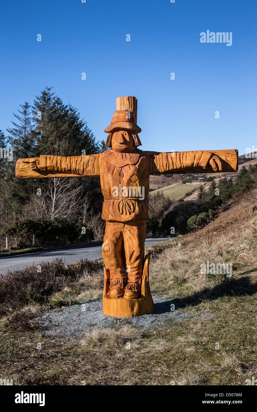 Carved wooden scarecrow on the Carbost road at the Isle of Skye in Scotland. Stock Photo
