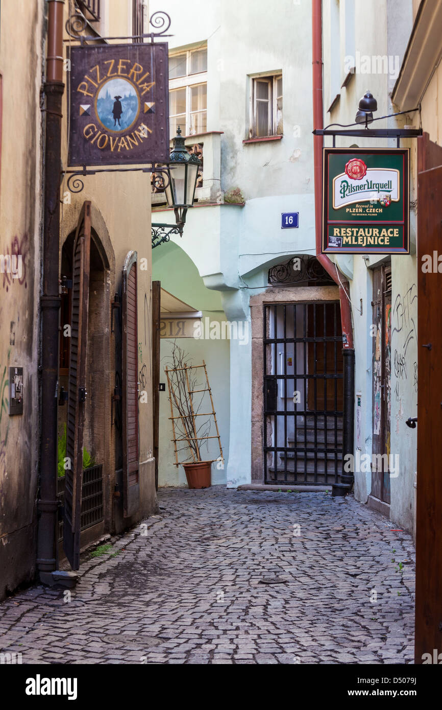 A small cobbled alleyway with bars and restaurants in the Old Town