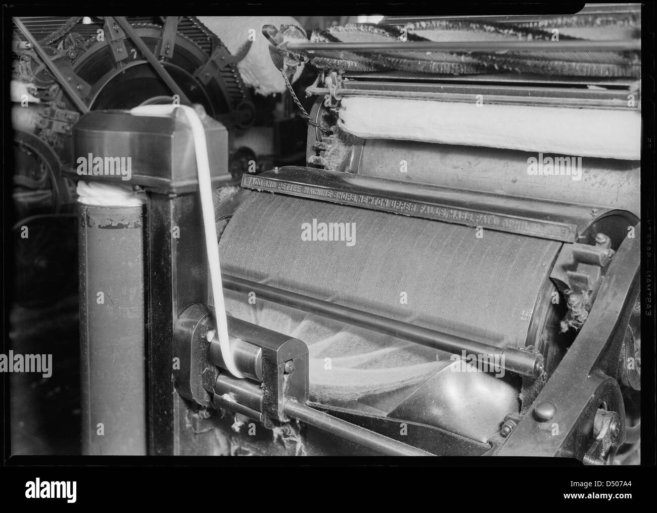 Textiles. Pacific Mills. Carding machine, April 1937 Stock Photo Alamy