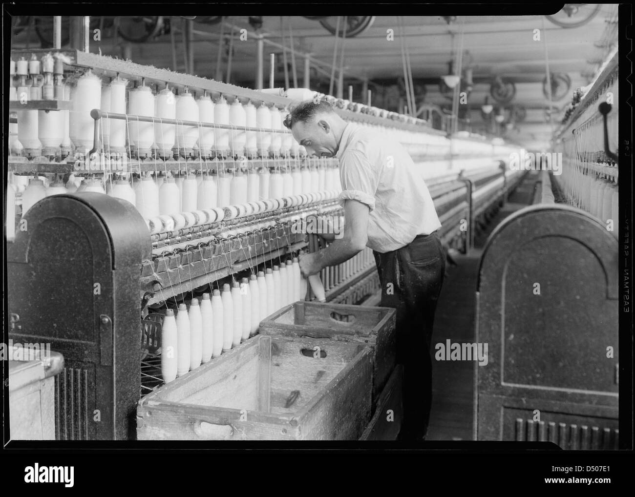Textiles. Pacific Mills. Spinning, Doffing machine, April 1937 Stock ...