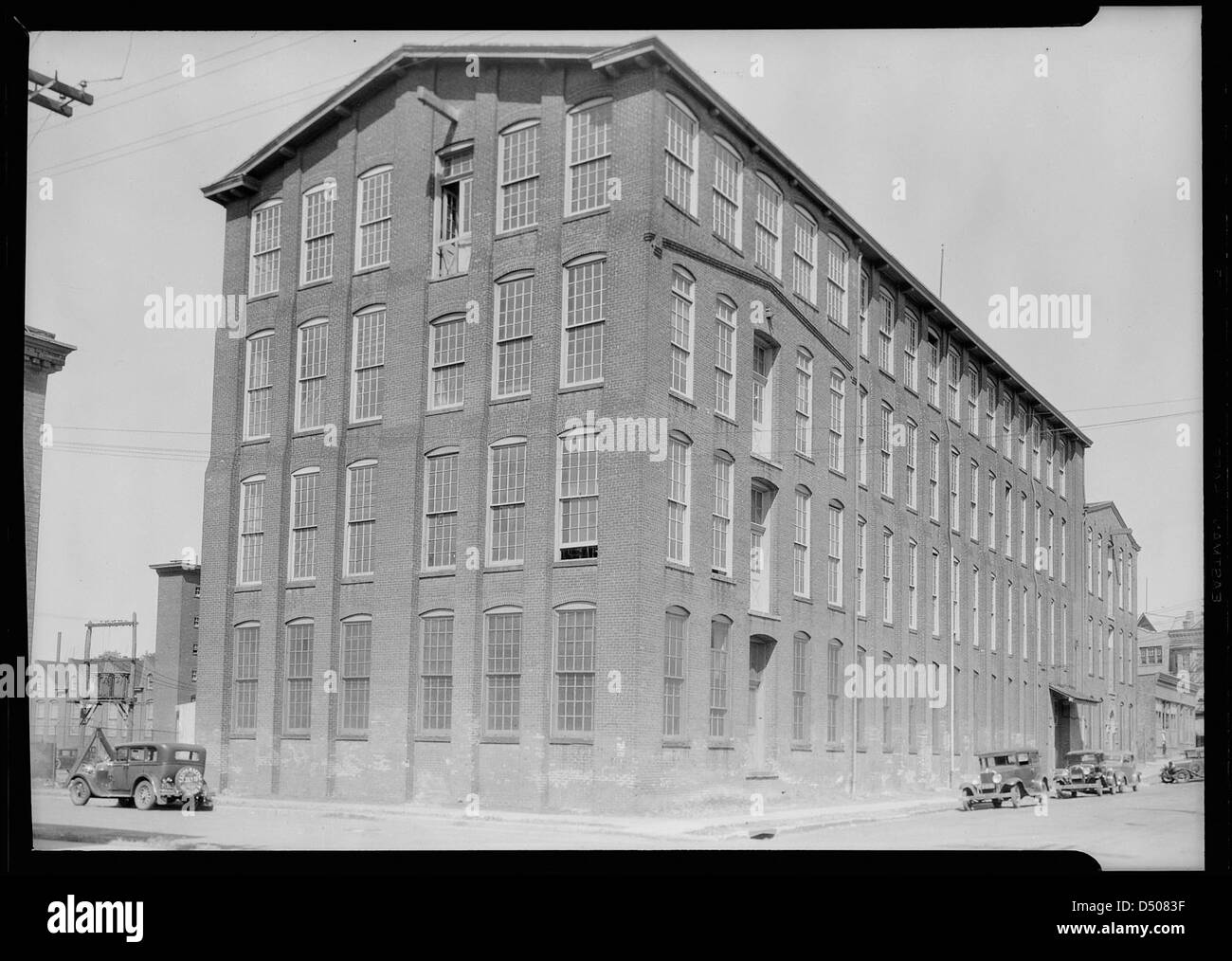 Textiles. Mill at 185 Sixth Avenue which houses a number of family shops, June 1937 Stock Photo