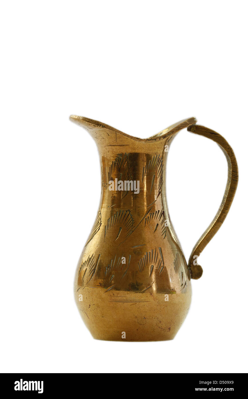 Vintage miniature brass jug isolated on white Stock Photo