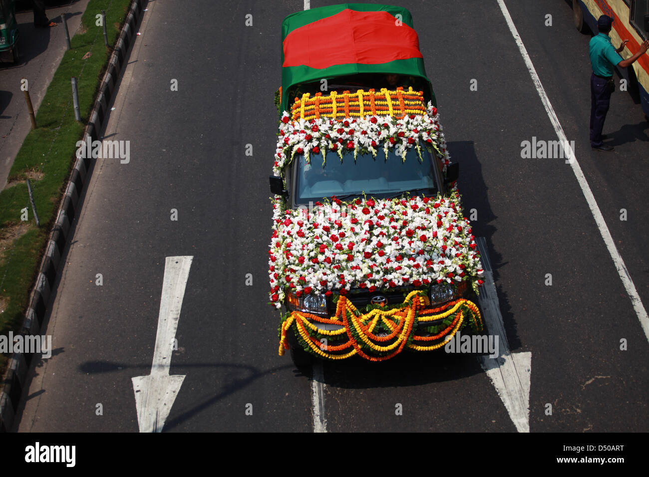 A vehicle with the coffin of Bangladeshi president Zillur Rahman on its way the Banghababhan (President's Palace) in Dhaka, Bangladesh, 21 March 2013. Rahman died 20 March at age 84 in hospital in Singapore, where he had been undergoing treatment for respiratory problems, the presidential palace said. The government declared three days of mourning for Rahman, who had been active in politics for more than six decades Stock Photo