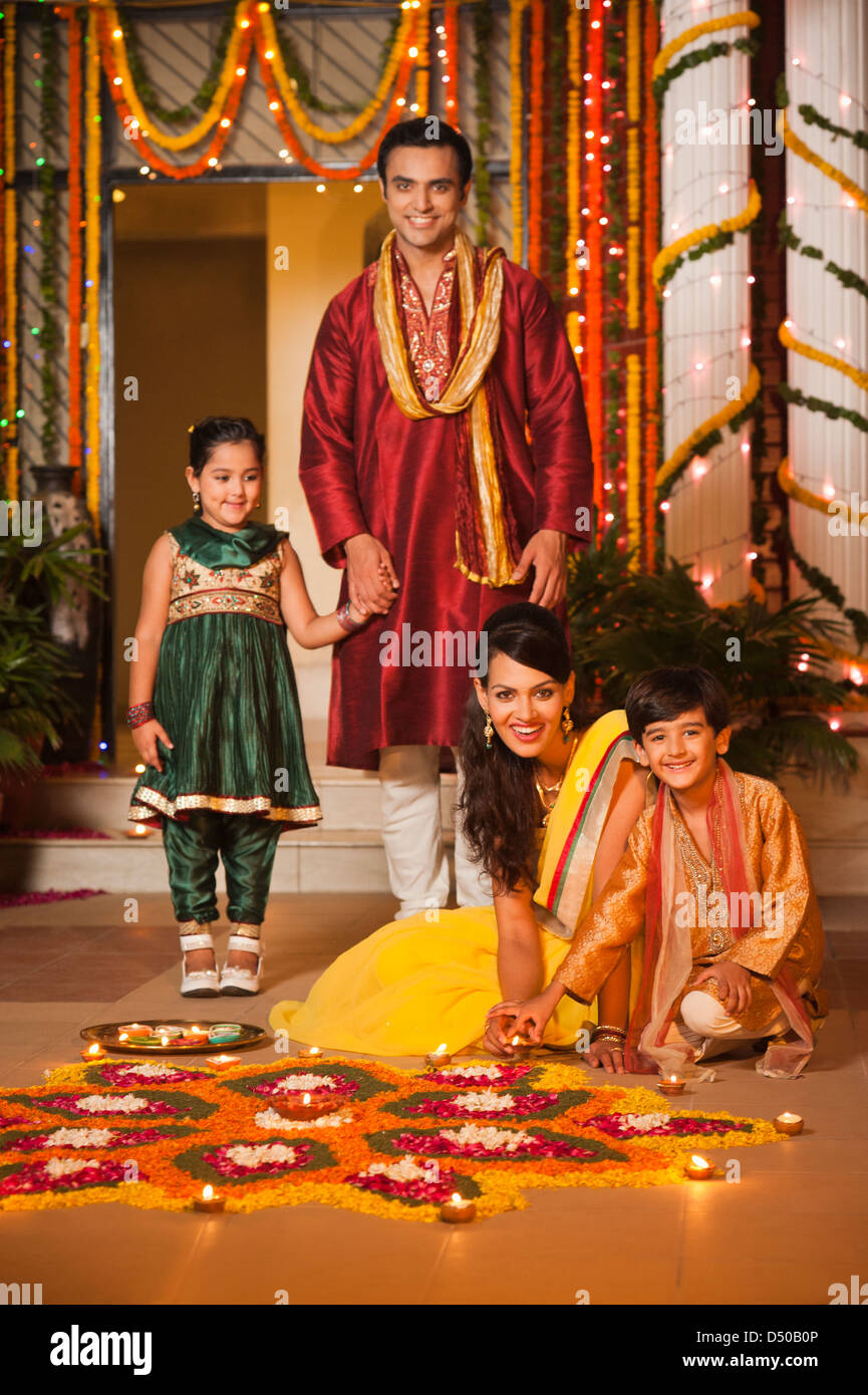 Rangoli family hi-res stock photography and images - Alamy