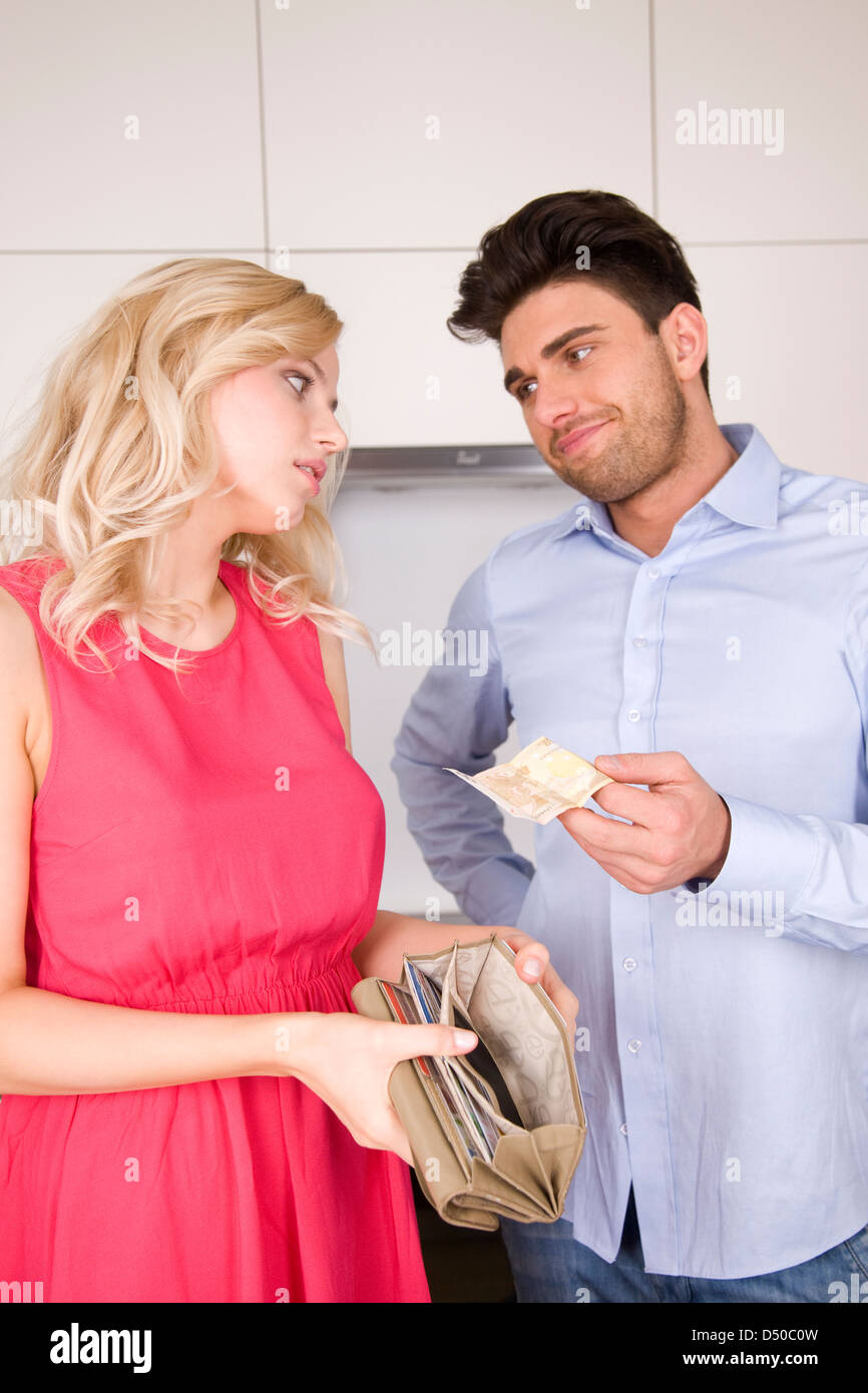 Woman borrowing money Stock Photo