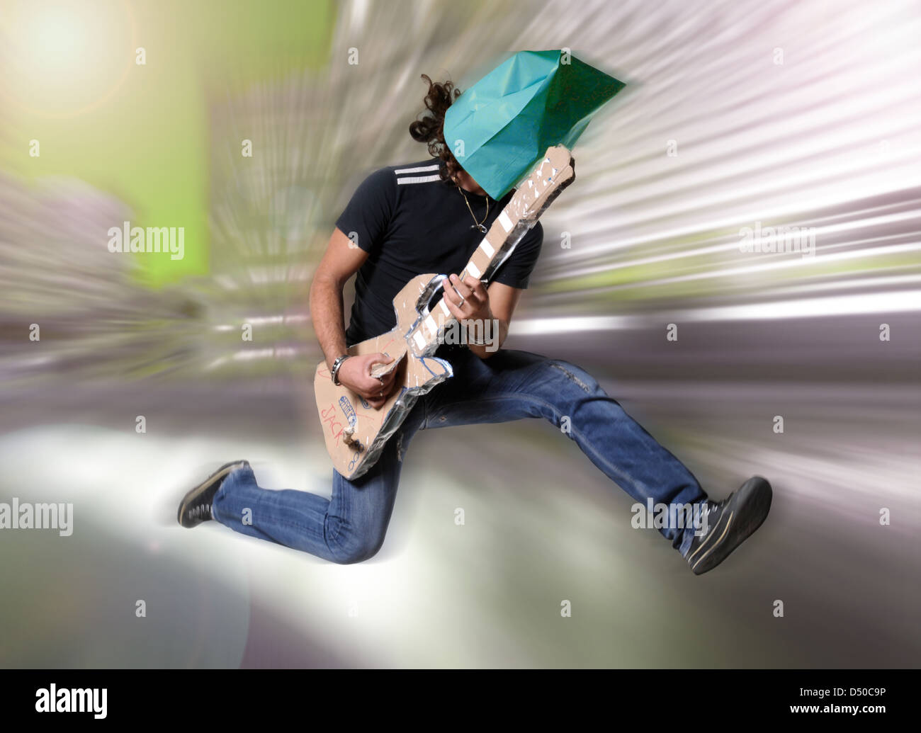 Man with carton fake guitar Stock Photo