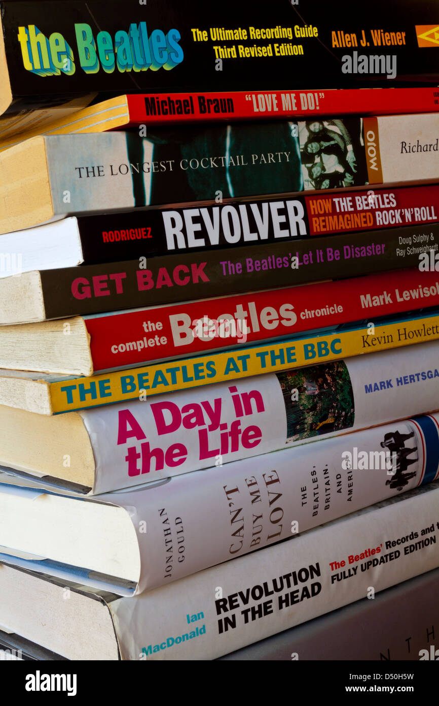 Close up view of books about The Beatles published in recent years showing continuing interest in the 1960s pop group Stock Photo