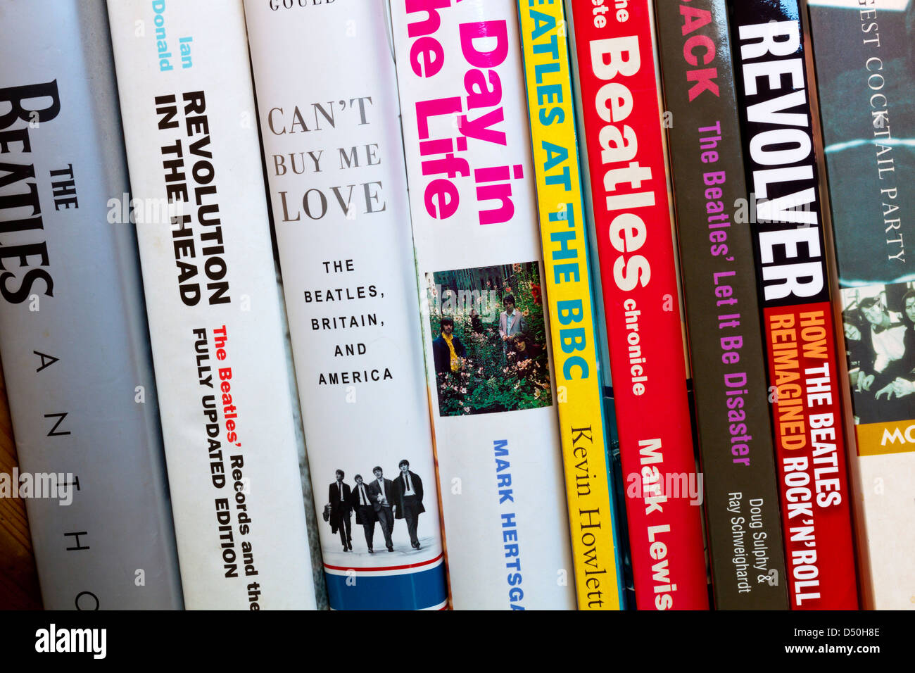 Close up view of books about The Beatles published in recent years showing continuing interest in the 1960s pop group Stock Photo