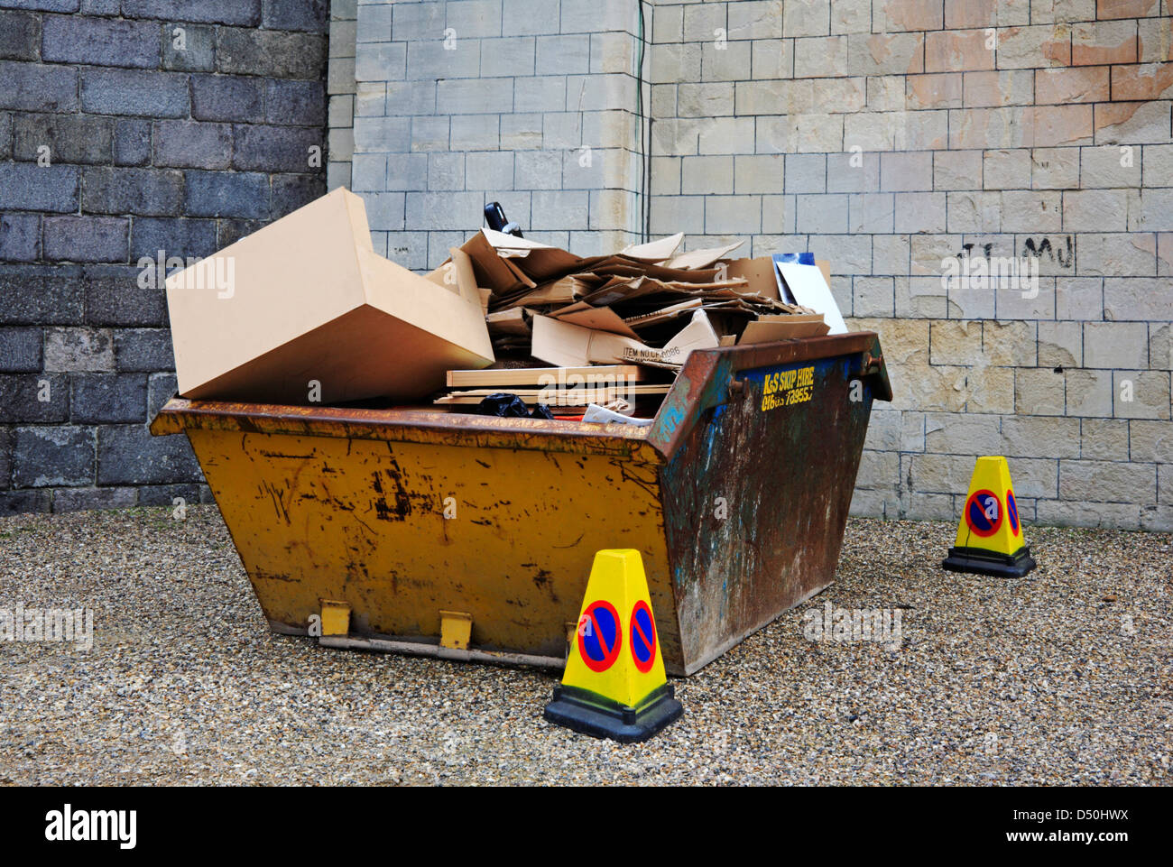 A rubbish skip full of cardboard for recycling Stock Photo Alamy
