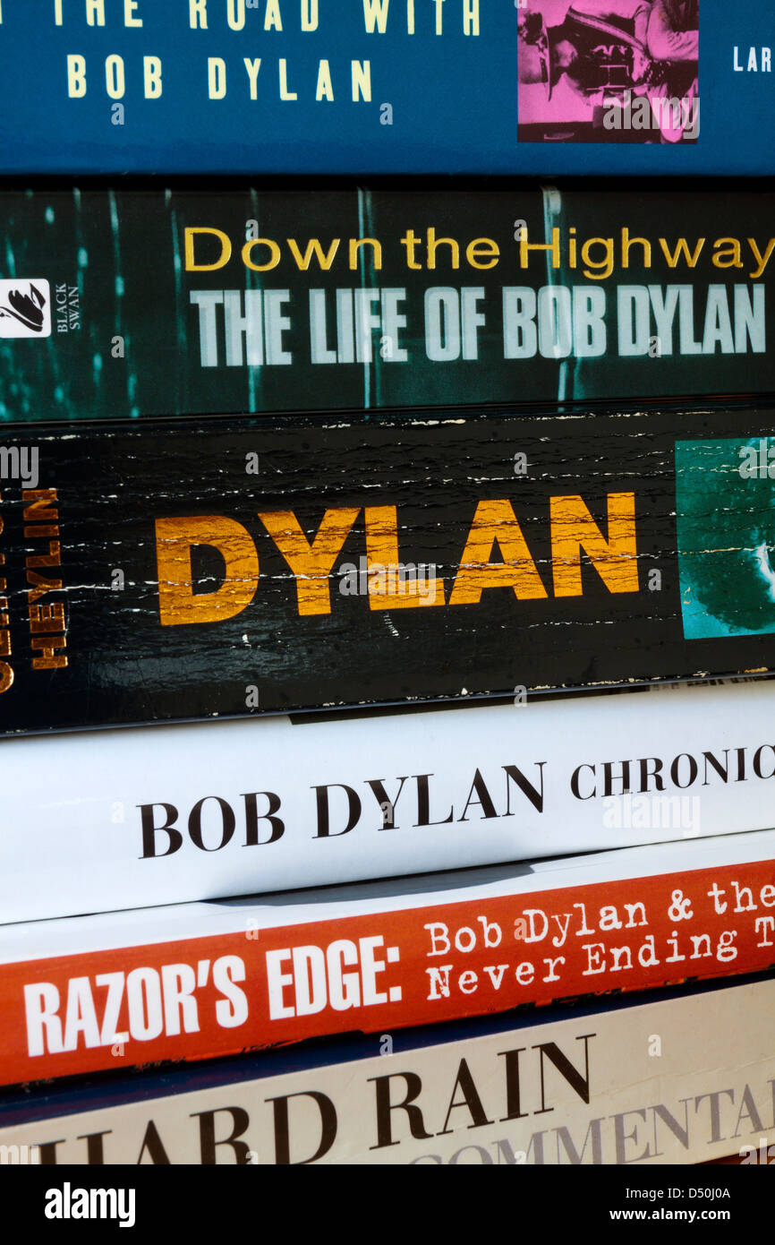 Close up view of books about Bob Dylan published in recent years showing continued interest in the songwriter and performer Stock Photo