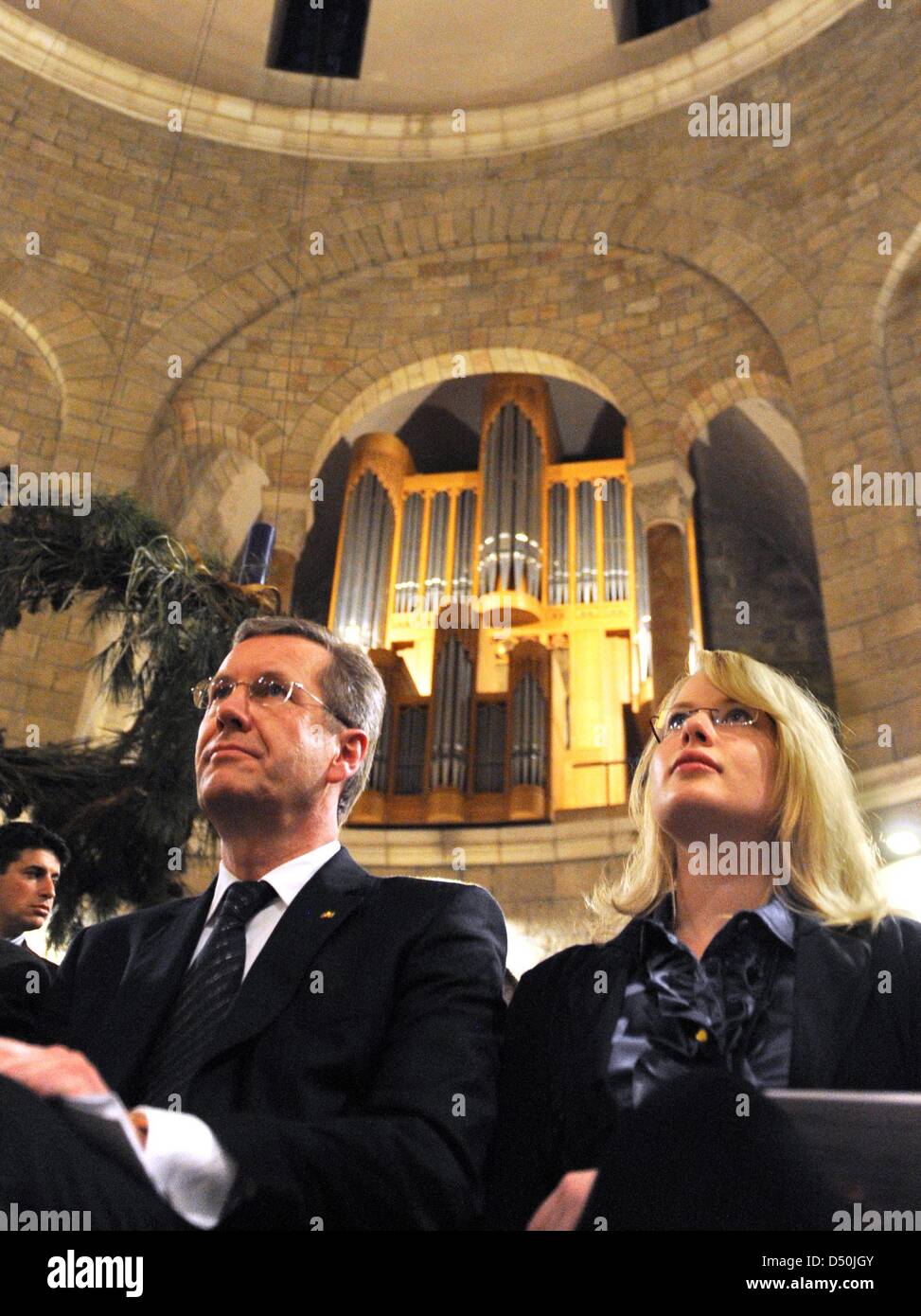 German President Christian Wulff and his daughter Annalena attend an ecumenical sevice on the first sunday in Advent at Dormitio Abbey in Jerusalem, Israel, 28 November 2010. Every sunday, German language services are held at that church. Wulff's state visits will end in the Palestinian territories in Tuesday 20 November. Photo: RAINER JENSEN Stock Photo
