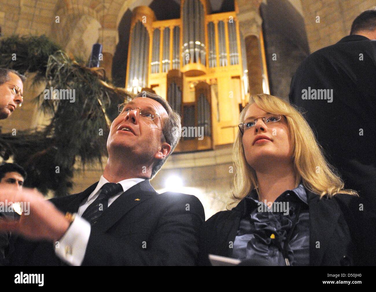 German President Christian Wulff and his daughter Annalena attend an ecumenical sevice on the first sunday in Advent at Dormitio Abbey in Jerusalem, Israel, 28 November 2010. Every sunday, German language services are held at that church. Wulff's state visits will end in the Palestinian territories in Tuesday 20 November. Photo: RAINER JENSEN Stock Photo