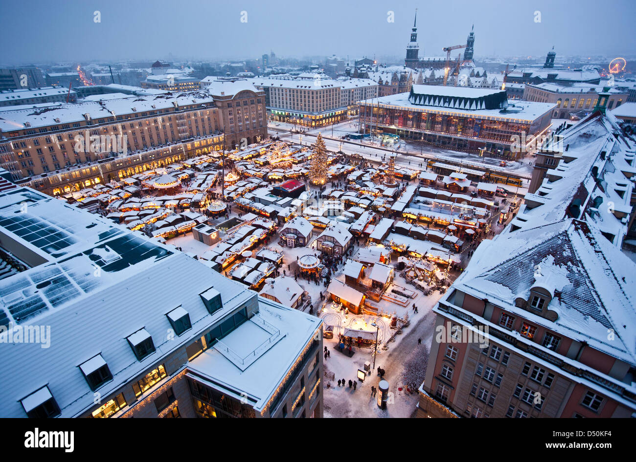 View over the snow covered Striezel Christmas market in Dresden, Germany,  29 November 2010. Photo: Oliver Killig Stock Photo - Alamy